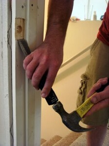Handyman Replacing Door Frame