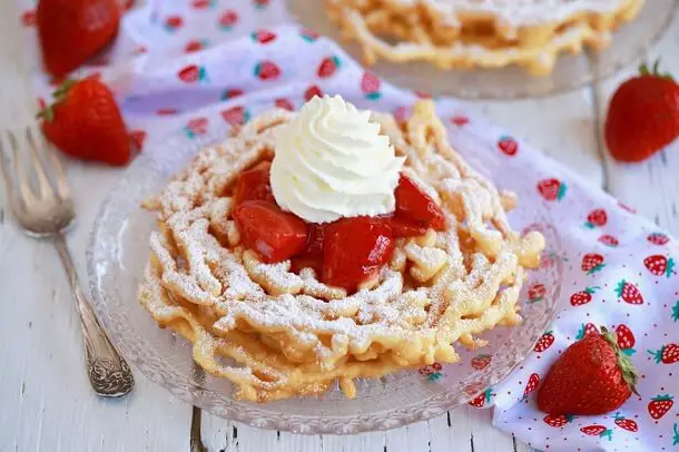 Funnel Cake With Cream and Strawberries