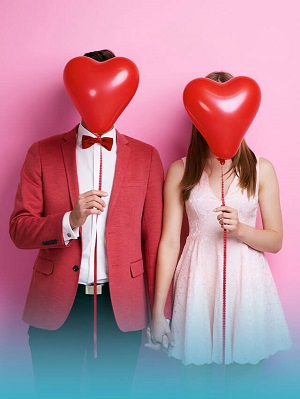 Couple Behind Heart Balloon