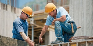 Two Men Working